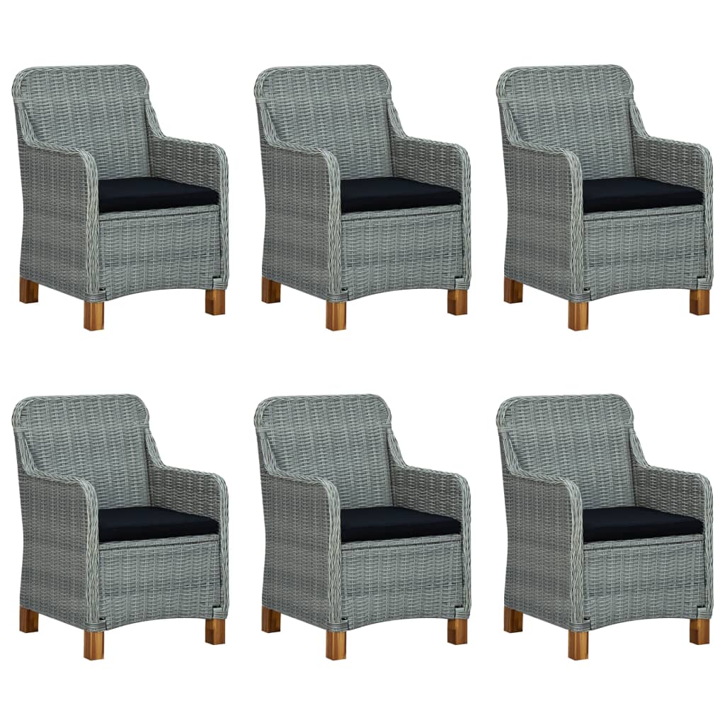 A view of the dining set, highlighting its removable black cushions and elegant design.