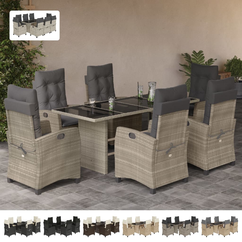 Adjustable reclining rattan garden chairs with thick beige cushions.