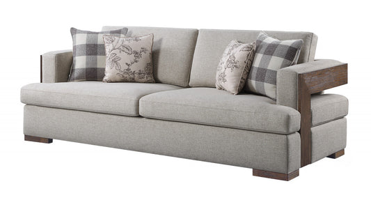 92" Beige Fabric Sofa And Toss Pillows With Brown Legs-0